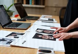 Publicist preparing media kit for rising star